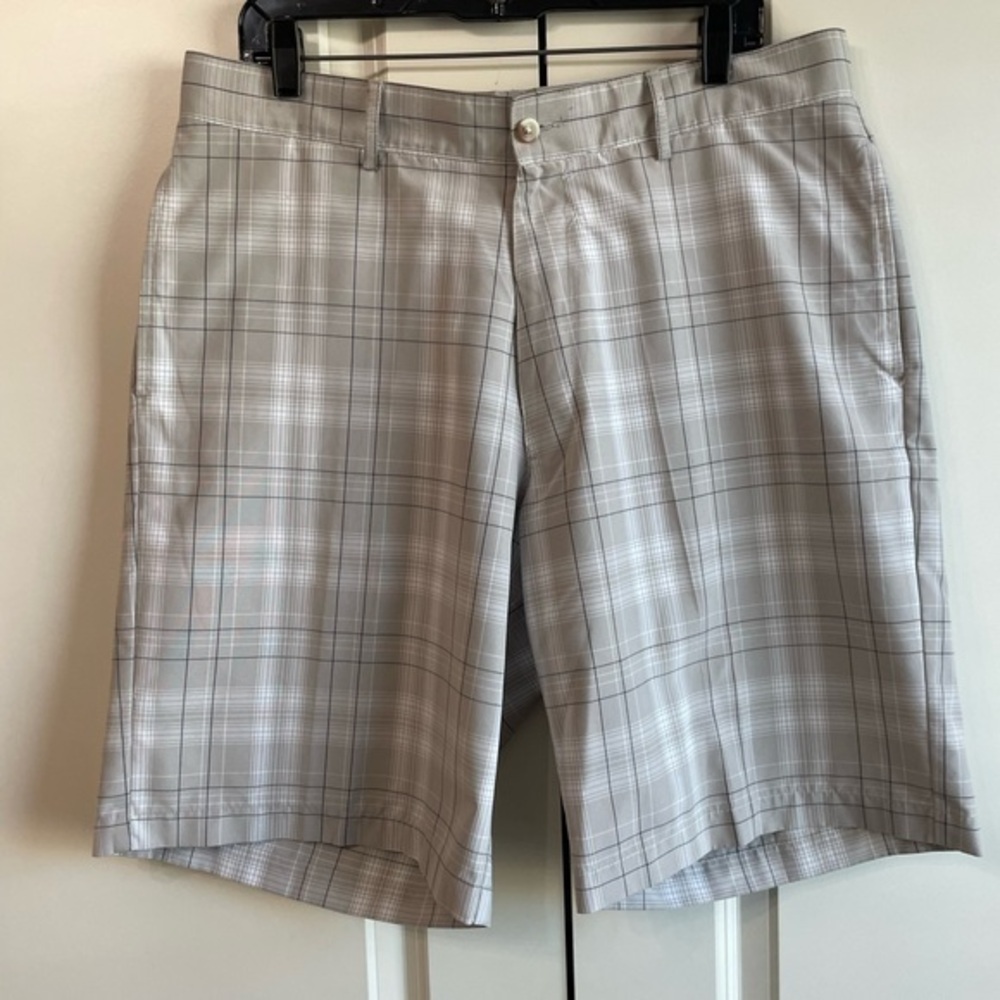 Pro tour cool play men’s golf shorts. From Belks.